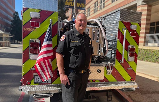 Steve by a fire truck