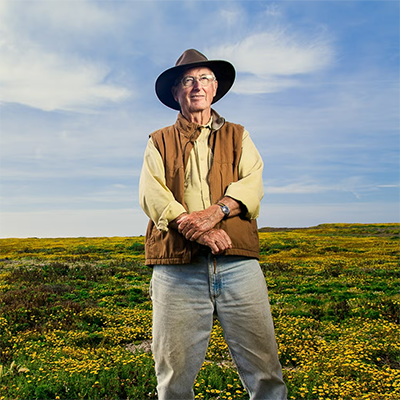 Lyndal Laughrin standing in a field